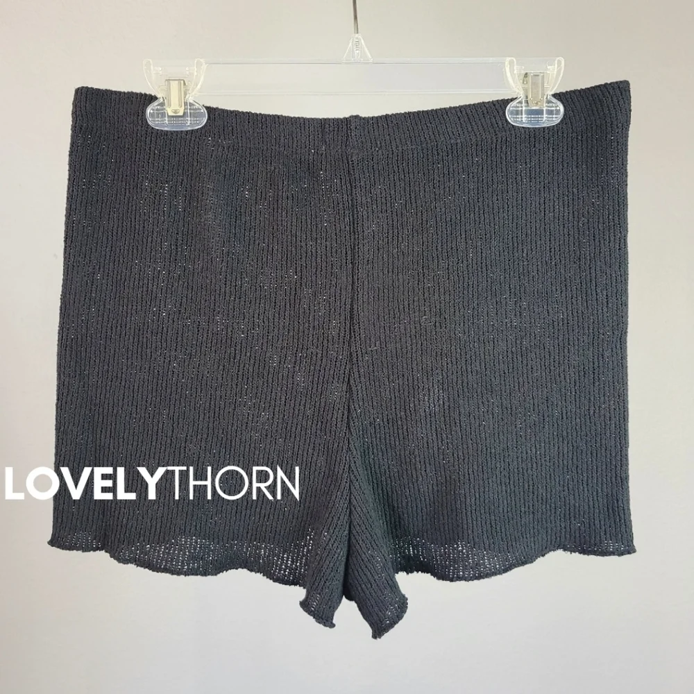 ZARA // black slightly frilled hem high elastic waist knit shorts